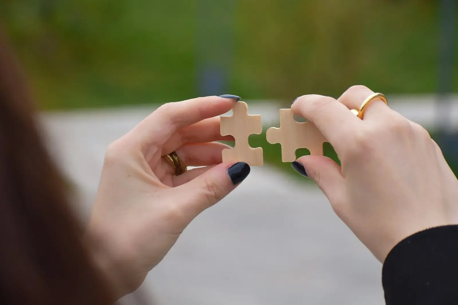 a person holding puzzle pieces